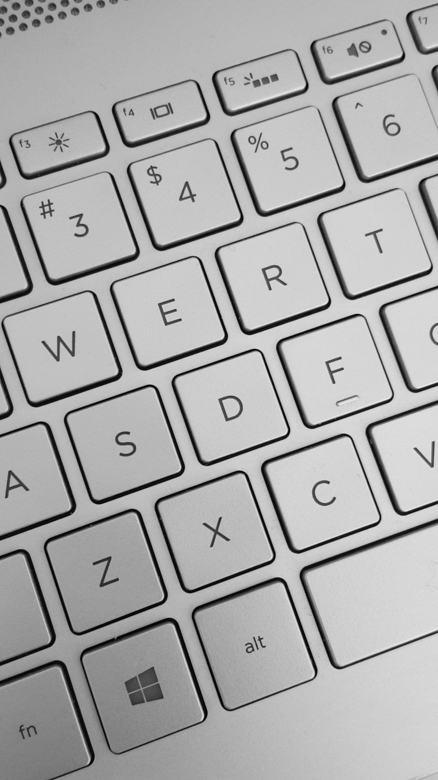 black and white close-up of a laptop keyboard